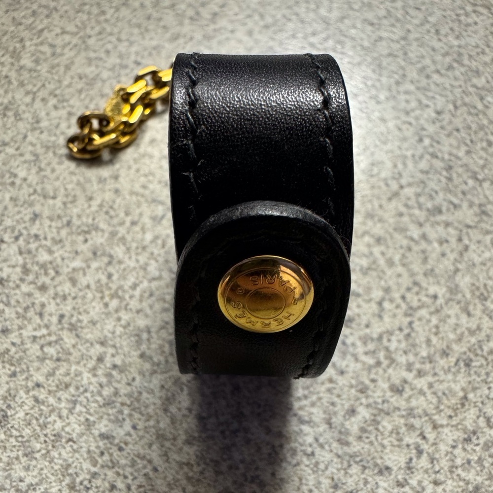 Hermès Black Leather Bracelet with Gold Accents